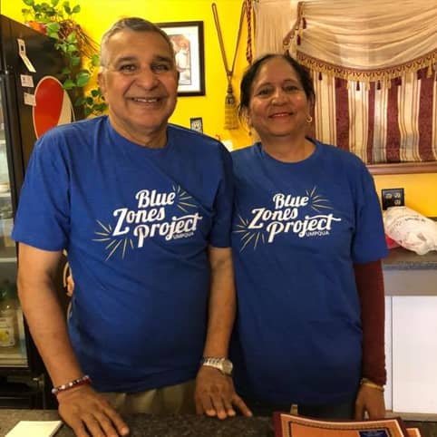 A photo of the owners of Shanti's Indian restaurant